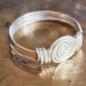 Preview: Schlichter Silberring mit handgebogener Spirale