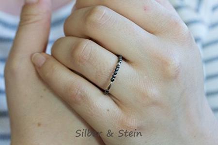 Edelstein-Ring mit grau facettiertem Hämatin und Silber
